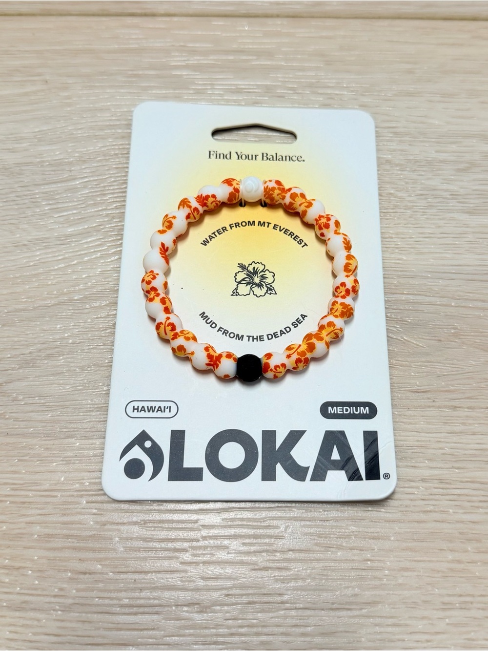 NWT Lokai Hawaii beaded silicone bracelet orange hibiscus floral pattern